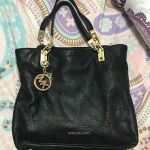 Michael Kors black leather bag.